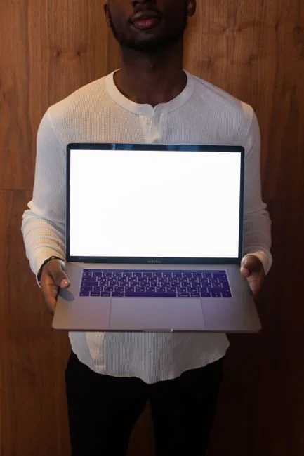 about-us-01 Laptop screen showing Pexels website, ideal for stock photo needs.